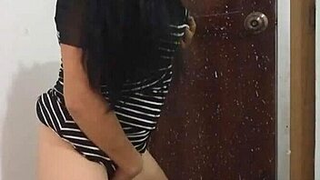 Sexy woman does a hot dance and flashes her ass before heading to a wedding