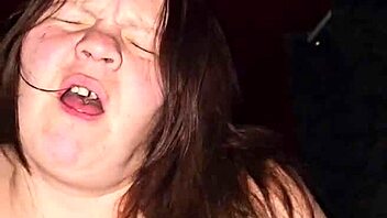 big white woman sits on object and makes moaning sounds