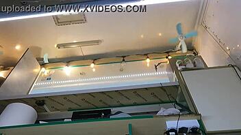 Boss Plays with Sexy Shop Assistant's Wet Pussy While She Talks to Customer