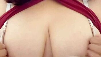 check out this slutty housewife with huge natural tits stripping and dancing for her online fans