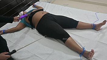 Hey, that Indian girl is having some wild BDSM fun with ropes and toys in this steamy session
