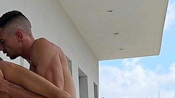 Tommy Cabrio and I got passionate on the balcony with neighbors watching our muscular outdoor fuck