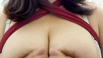 check out this slutty housewife with huge natural tits stripping and dancing for her online fans