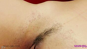 In a cozy sofa setting, a beautiful brunette teen 18+ enjoys a relaxing massage session during her casting interview.