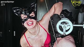 The session involves electricity applied to nipples, balls, cock, and plug for intense domination.