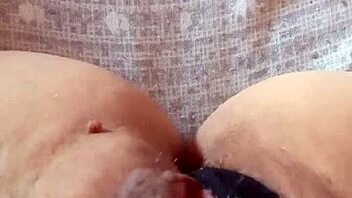 Gretala shows off her pregnancy with a transparent thong in a sensual display.