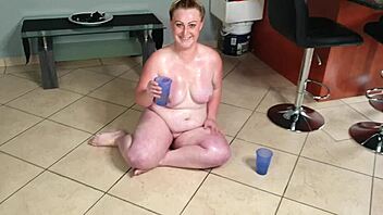 Oh man, check out this busty fat slut playing in piss and sucking her soaked toes
