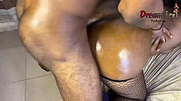 Ebony amateur rides oiled big cock doggystyle