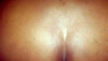 The ebony cougar gets oiled up and takes that big dick deep