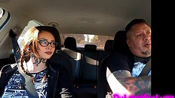 Tattooed brunette cutie gives hot blowjob during casting interview on way to hotel
