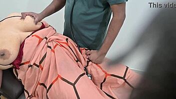 Indian doctor examines lady patient thoroughly in the clinic setting