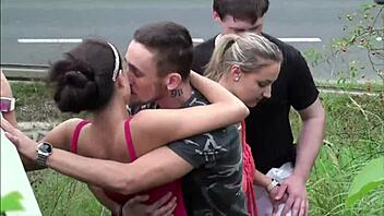 Huge tits on Krystal Swift get covered in cum during public foursome orgy by the highway