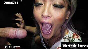 how does this super hot asian babe deepthroat all those gloryhole cocks so sloppily?