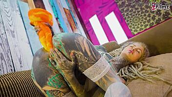 want to see tattooed girl in fishnets and heels doing solo anal with big dildo?