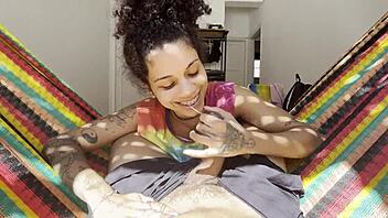 Curly ebony beauty gives wet blowjob then rides big cock in homemade video