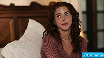 Lumi Ray chats with muscular Nathan Bronson in a friendly encounter