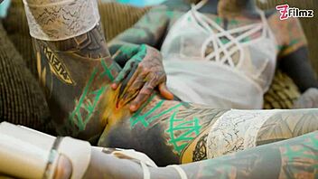 want to see tattooed girl in fishnets and heels doing solo anal with big dildo?