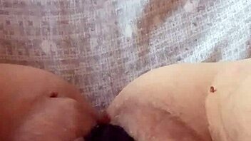 Gretala shows off her pregnancy with a transparent thong in a sensual display.