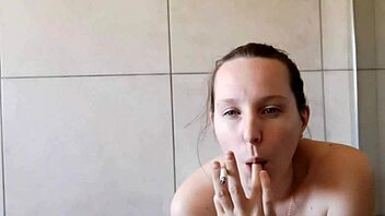 hey, look at this cute girl smoking in the bathroom all skinny and homemade.