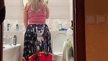 The curvy woman's wide hips spread apart in the bathroom. They dove into intense anal fucking right there.