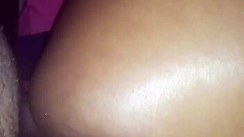 The ebony cougar gets oiled up and takes that big dick deep