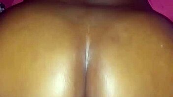 The ebony cougar gets oiled up and takes that big dick deep