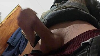 in the bathroom i hear rain outside while happily masturbating my big cock solo