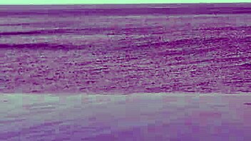 Chatting about relaxing by the infinity pool with scenic views