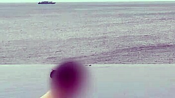 Chatting about relaxing by the infinity pool with scenic views