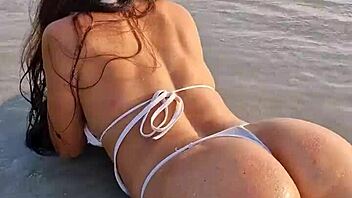 beach flashing in white sexy bikini
