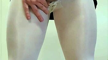 In this compilation, a tgirl with large endowment climaxes while wearing pantyhose