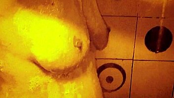 sexy milf takes slow motion shower massaging wet tits and ass