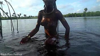 Skinny african village girl struts naked outdoors seeking intense cock action.