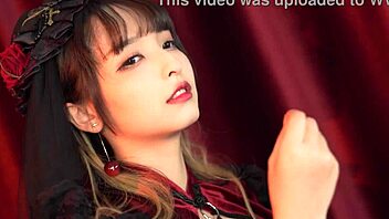 God! Cosplay babe in costume poses seductively!