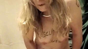 French housewife in bondage uses dildo and vibrator during solo session with chains and clamps