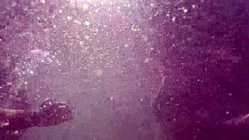 Hot milf enjoys underwater sex in the pool with big assets. She rides and licks in a steamy shower encounter.