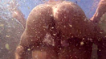 Hot milf enjoys underwater sex in the pool with big assets. She rides and licks in a steamy shower encounter.