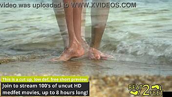 Feet rubbing beach rock