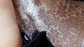 Gretala the hairy milf struts confidently in her tall boots for a teasing display.