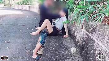 the adventurous student takes his girlfriend for an outdoor encounter in the park, capturing every passionate moment