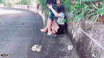 the adventurous student takes his girlfriend for an outdoor encounter in the park, capturing every passionate moment