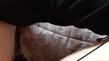 Gretala the hairy milf struts confidently in her tall boots for a teasing display.