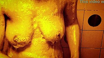 sexy milf takes slow motion shower massaging wet tits and ass