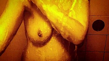 sexy milf takes slow motion shower massaging wet tits and ass