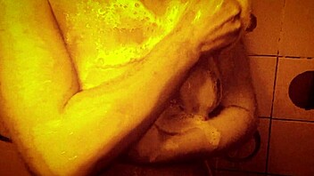 sexy milf takes slow motion shower massaging wet tits and ass