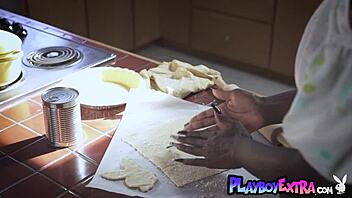 Wow, check out this glamorous all-natural ebony teen stripping naked in the kitchen, showing her tits and ass