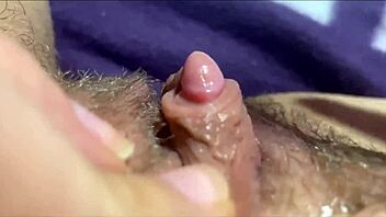 close-up view reveals massive clit pulsing during intense orgasm session