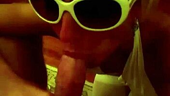 Blonde milf in bikini and glasses drains cock with sloppy blowjob