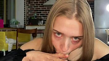 This cutie gives me a blowjob before slipping on the condom. She sucks eagerly until it's time for protection.