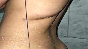 Mature Brazilian milf indulges in anal assfucking and squirting in steamy shower session.